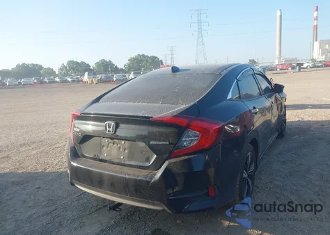 2017 Honda Civic Touring z USA, uszkodzony, nr VIN 19XFC1F95HE010135